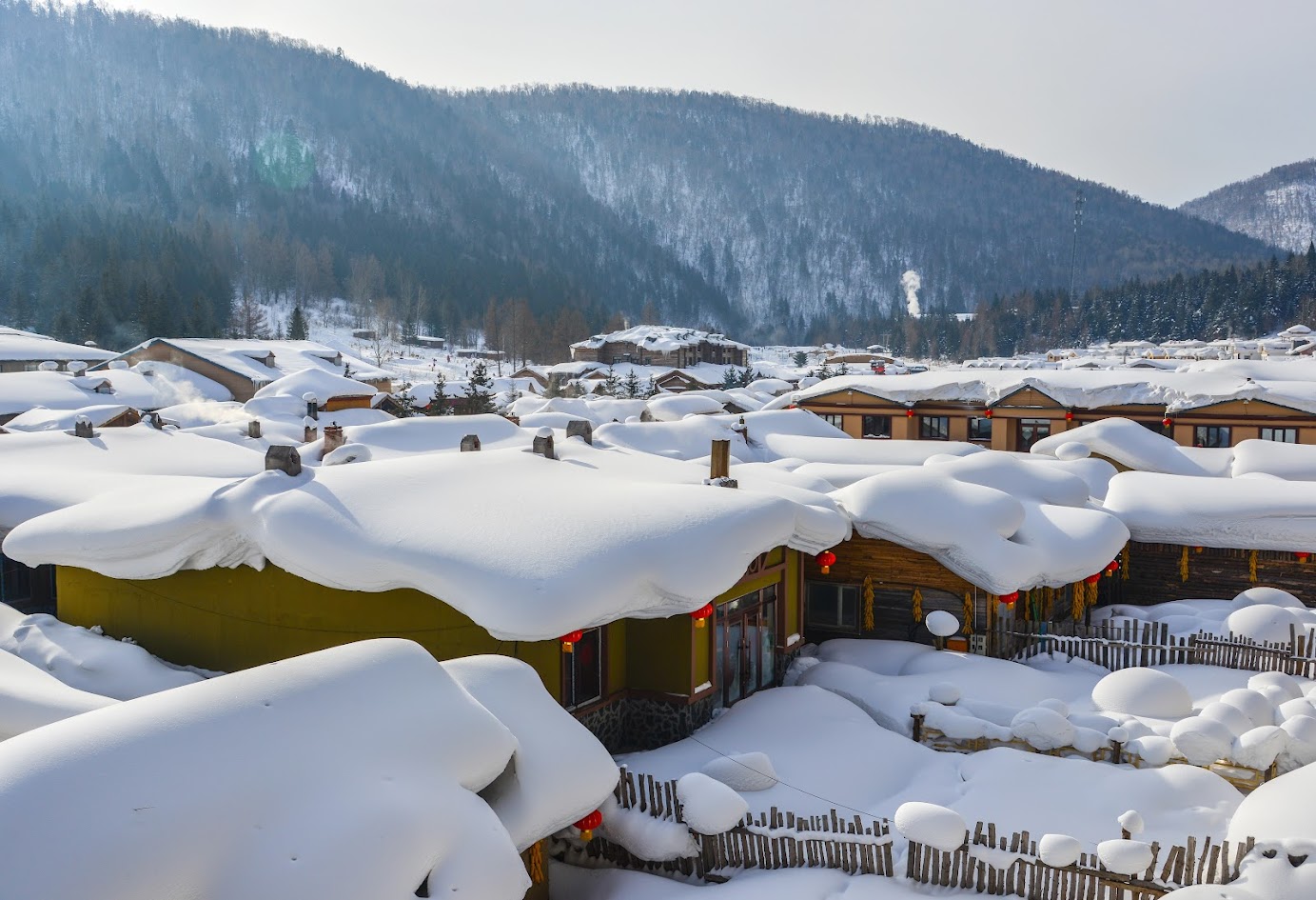 Snow village at sunny day in Mohe County, Northernmost China.